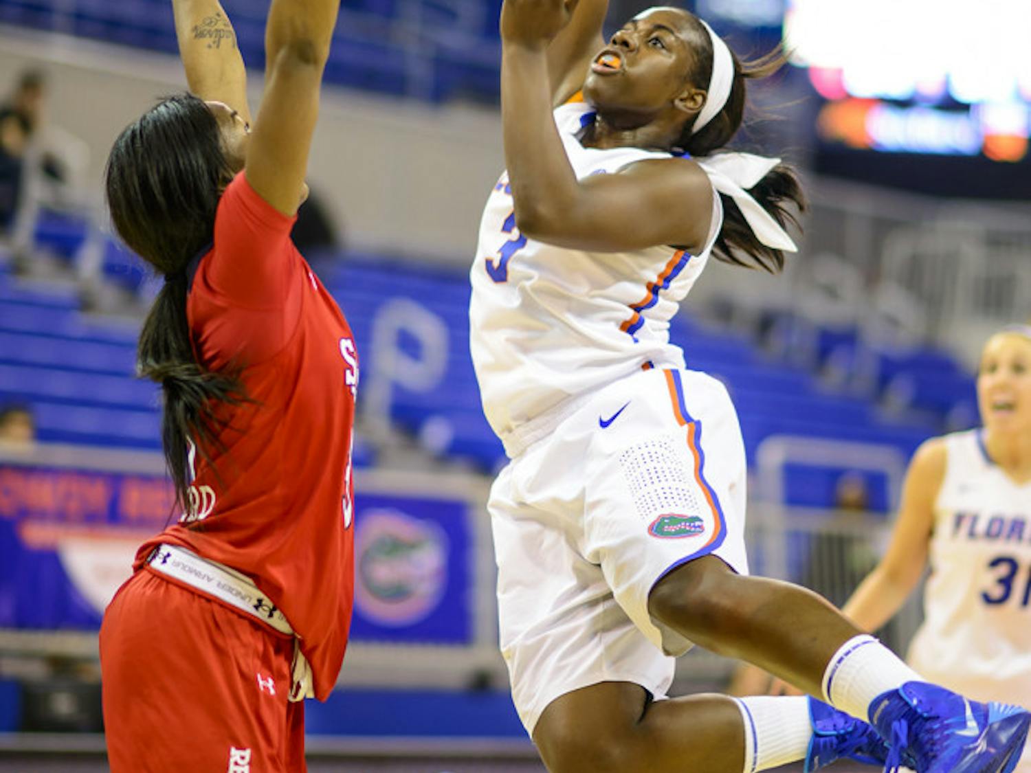 Sophomore guard January Miller attempts a floater down the lane during Florida's 72-68 win against St. John's on Nov. 26 in the O'Connell Center.