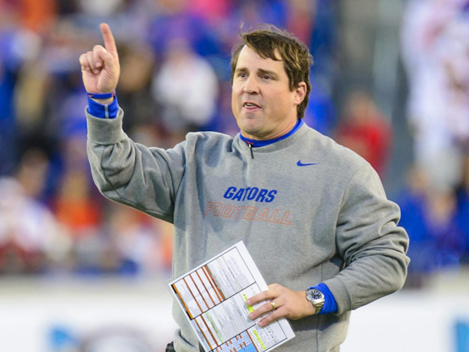 Will Muschamp signals during UF's 38-20 win against UGA on Nov. 1 at EverBank Field in Jacksonville.