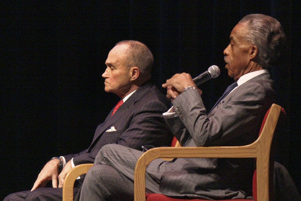 <p>Rev. Al Sharpton, right, and former New York City police commissioner Raymond Kelly speak at ACCENT Speakers Bureau’s “A Conversation on Policing, Gun Violence, and Civil Rights” event Nov. 17, 2015, in the Phillips Center.</p>