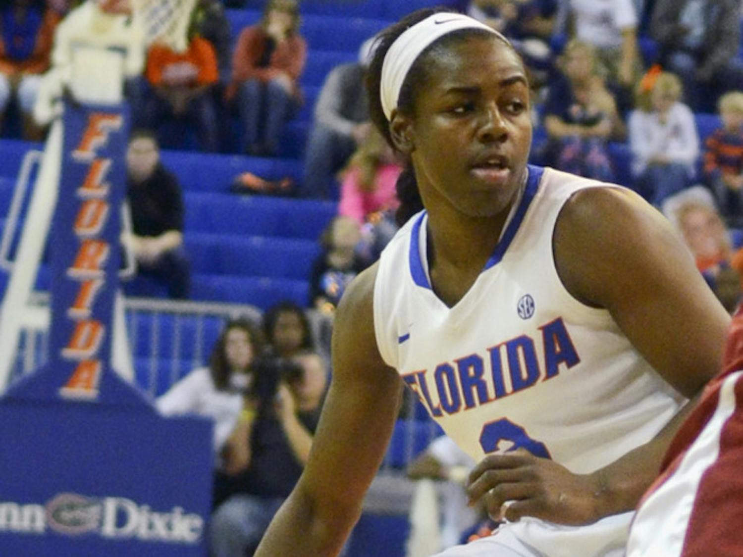 January Miller drives into the lane during Florida's 72-58 win against Arkansas on Sunday in the O'Connell Center.