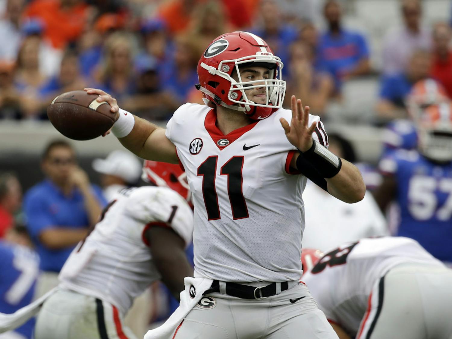 Georgia quarterback Jake Fromm (11) throws a pass against Florida in the first half of an NCAA college football game, Saturday, Oct. 28, 2017, in Jacksonville, Fla. (AP Photo/John Raoux)