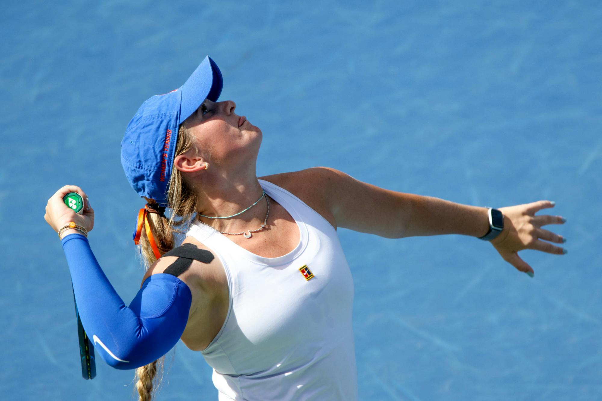 Florida senior Carly Briggs serves the ball during the Gators' 4-1 win against the No. 3 Michigan Wolverines Wednesday, March 22, 2023.
