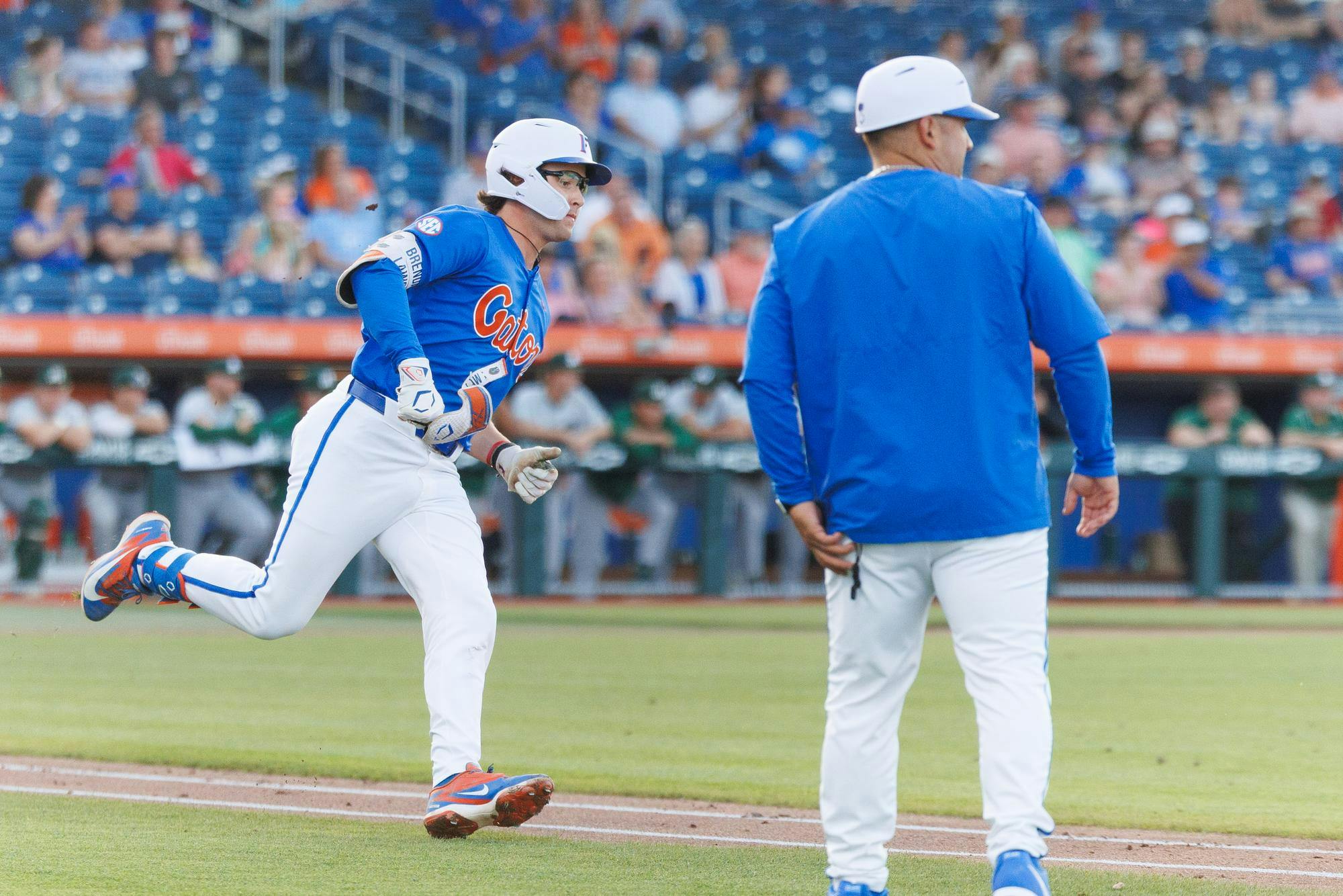Florida infielder Brendan Lawson (11) runs to first base during an NCAA baseball game against Jacksonville University, Tuesday, March 31, 2026, in Gainesville, Fla.