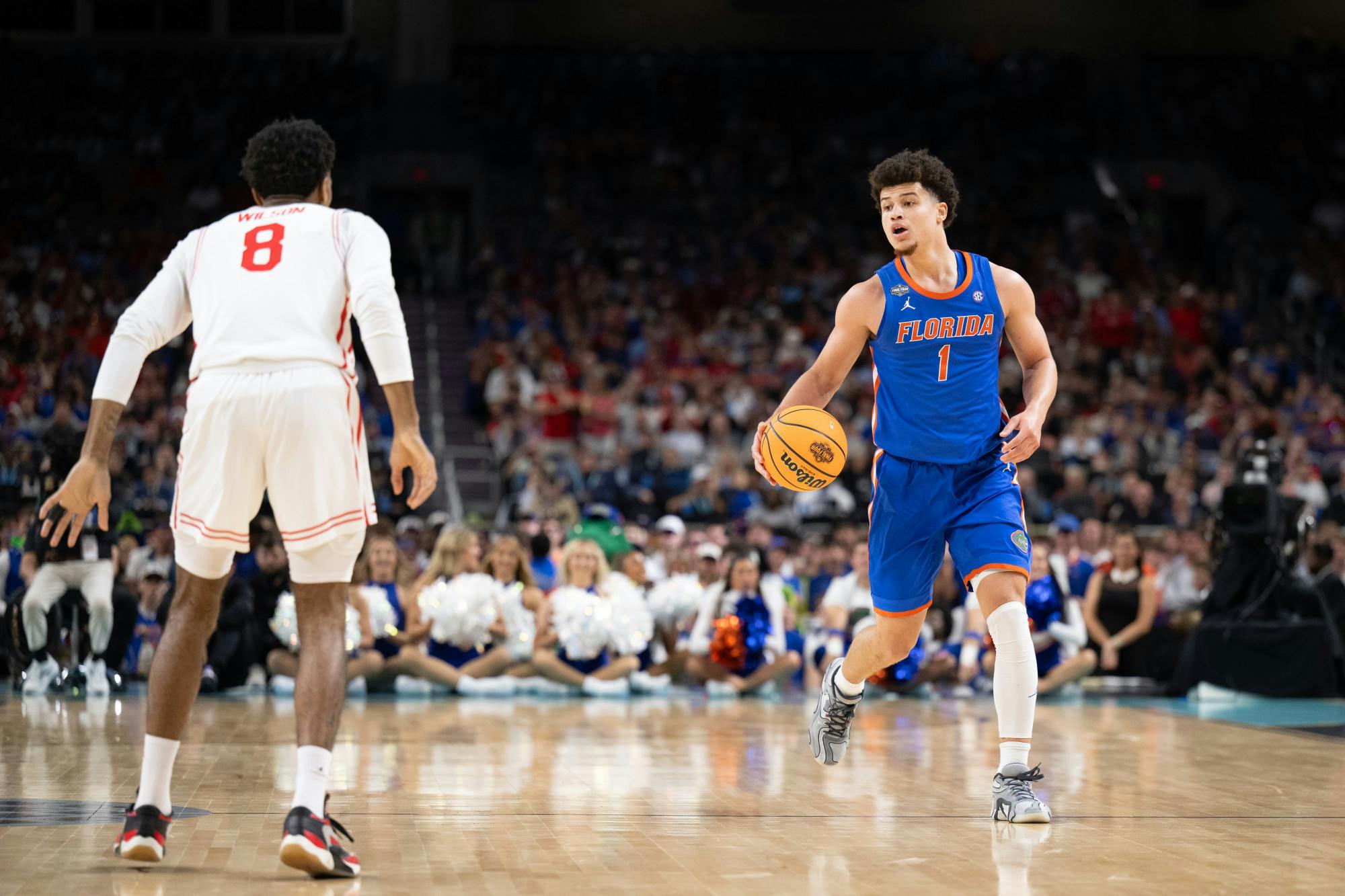 Florida Gators guard Walter Clayton Jr. (1) dribbles the ball during a basketball game against the Houston Cougars in the National Championship round of the NCAA Tournament on Monday, April 7, 2025, in San Antonio, Texas.