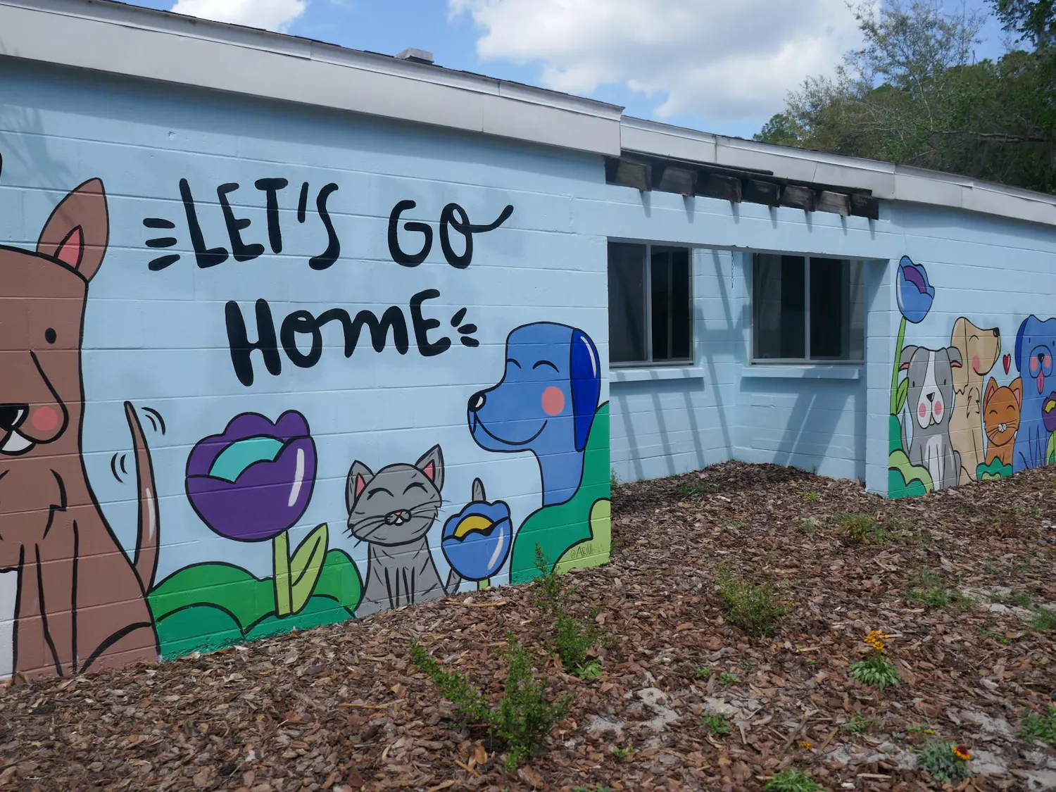 A mural on the front of Alachua County Animal Resources on Tuesday, March 31, 2026, in Gainesville, Fla.