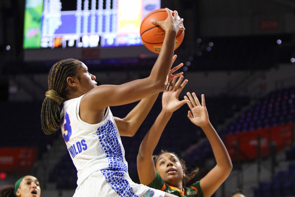 <p>Freshman guard Laila Reynolds attempts a layup in the Gators&#x27; 92-54 win against the Florida A&amp;M Rattlers on Monday, Nov. 13, 2023.</p>