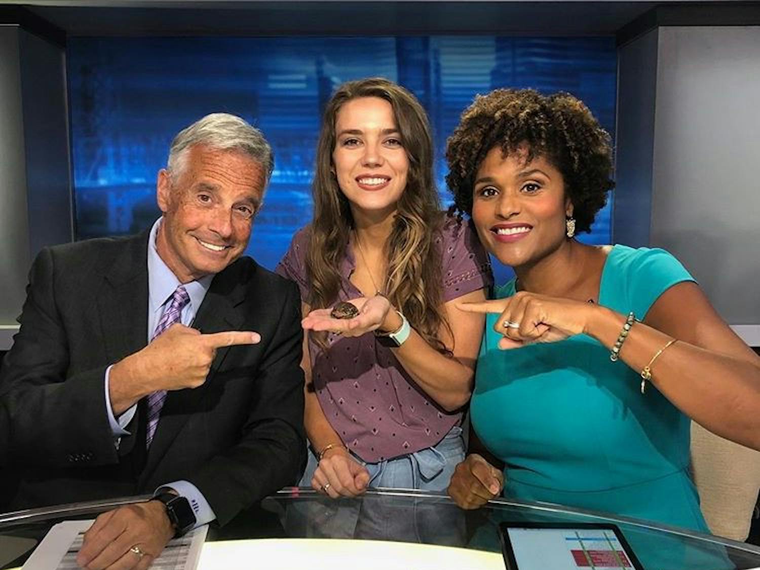 Savannah Mikell (center) and Toby the Toad appeared on Jacksonville's WJXT Channel 4 News on July 31.