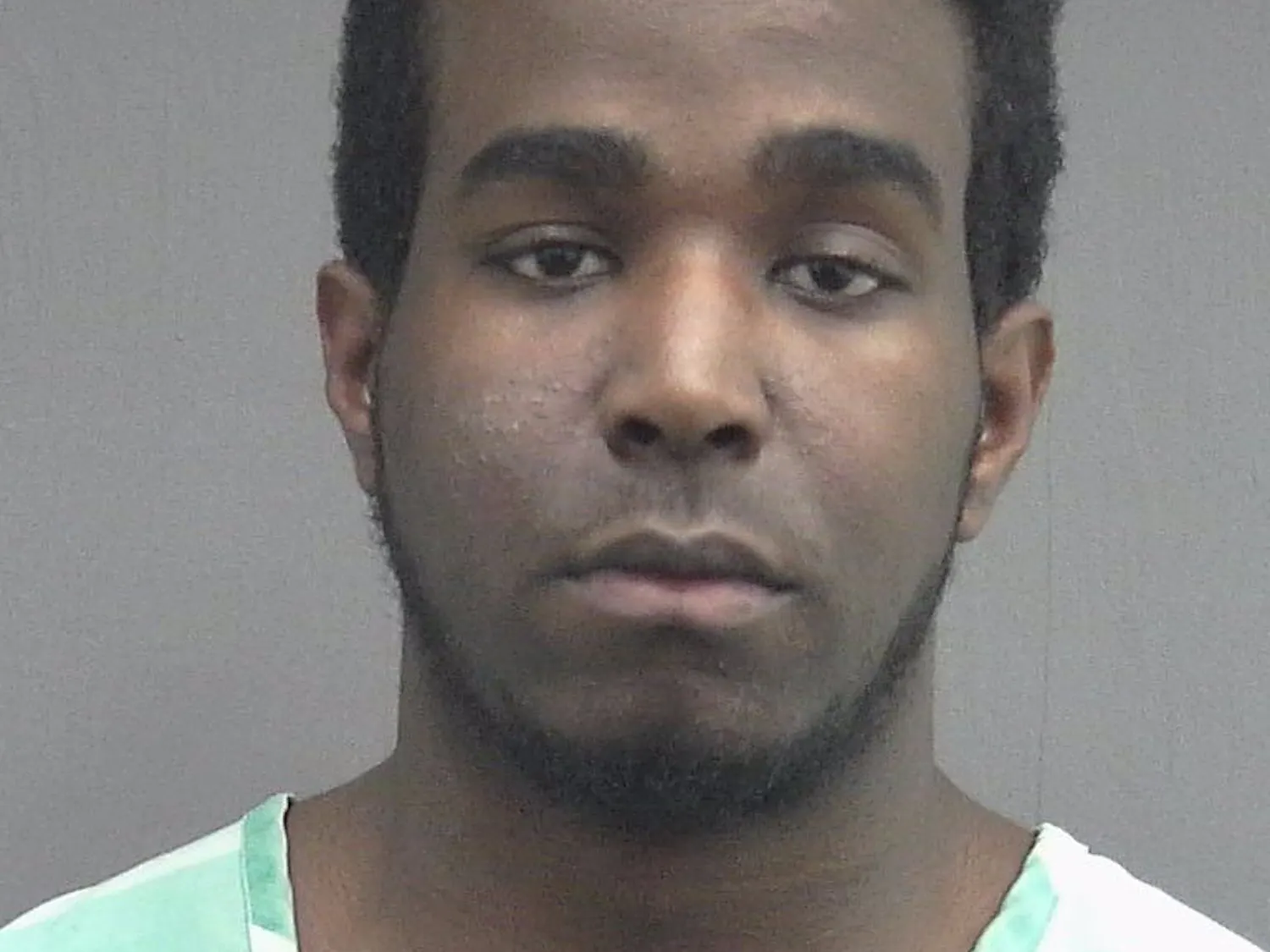 Eric Garvin, 23, was fired from working at UF's Einstein Bros. Bagels Tuesday after police charged him with sexual assault five days earlier. He had worked there since 2012. 