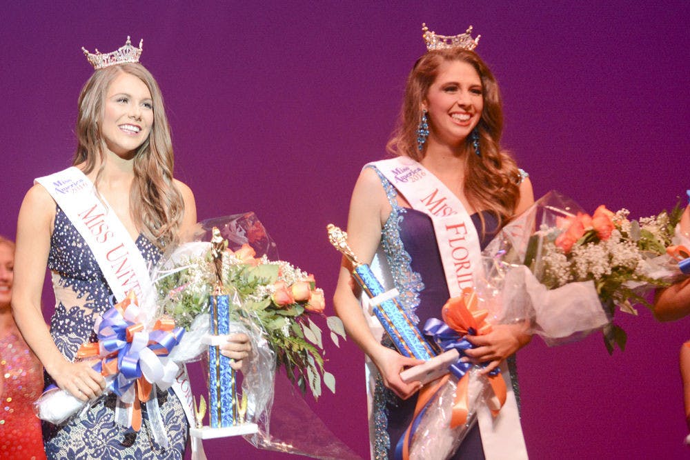 <p>Newly crowned Miss University of Florida Savannah Judkins smiles to the audience alongside the new Miss Florida Gator Rachel Smith, a UF telecommunication senior.</p>