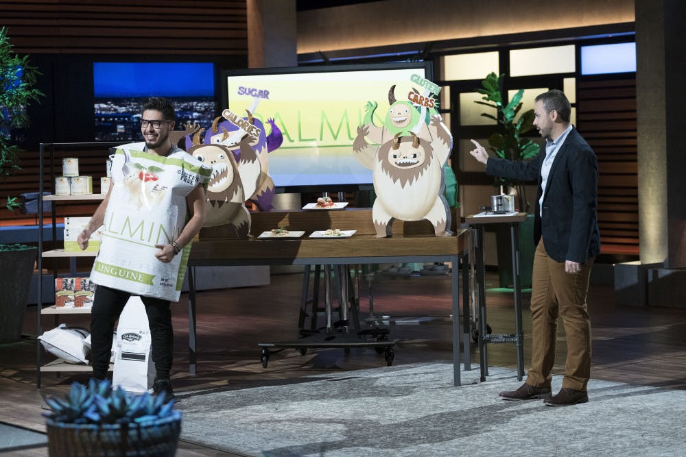 UF alumnus Alfonso Tejada, right, pitches his product Palmini on Shark Tank.  