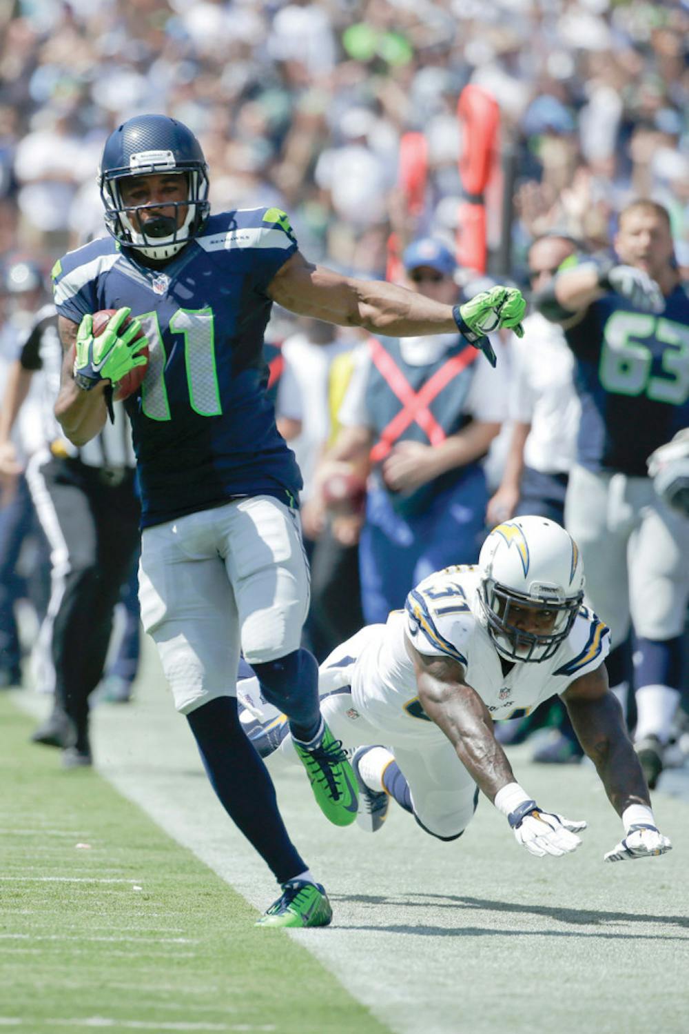 <p>Seattle Seahawks wide receiver Percy Harvin appears to step out of bounds while running for a touchdown as San Diego Chargers cornerback Richard Marshall defends on Saturday.</p>