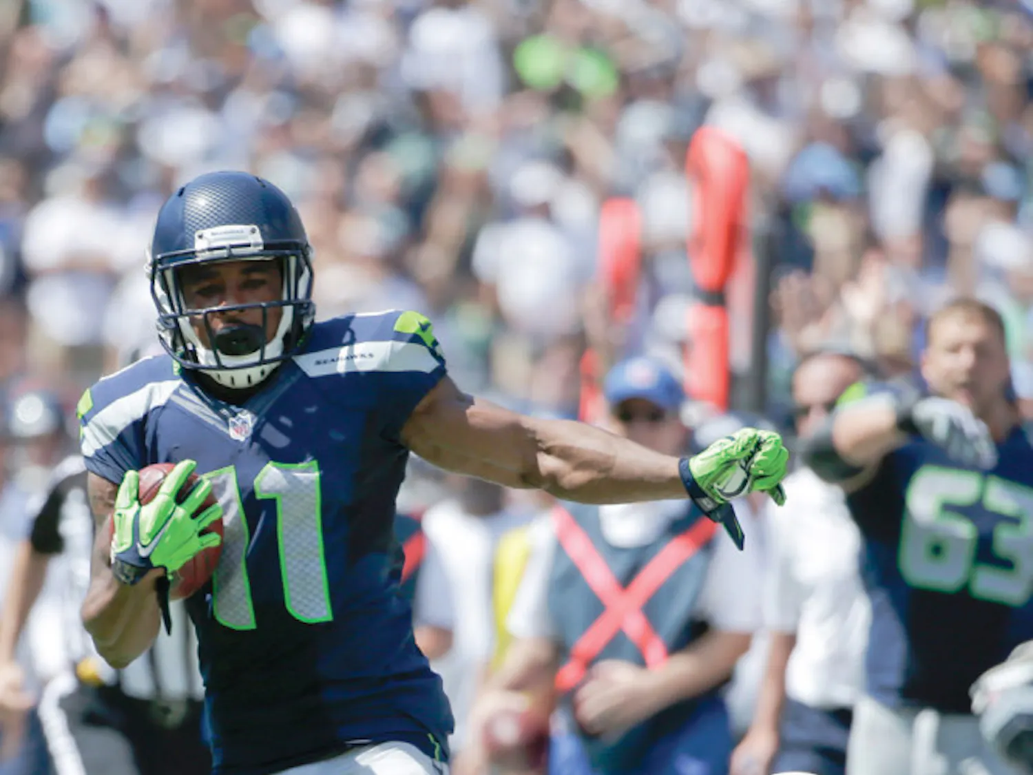 Seattle Seahawks wide receiver Percy Harvin appears to step out of bounds while running for a touchdown as San Diego Chargers cornerback Richard Marshall defends on Saturday.