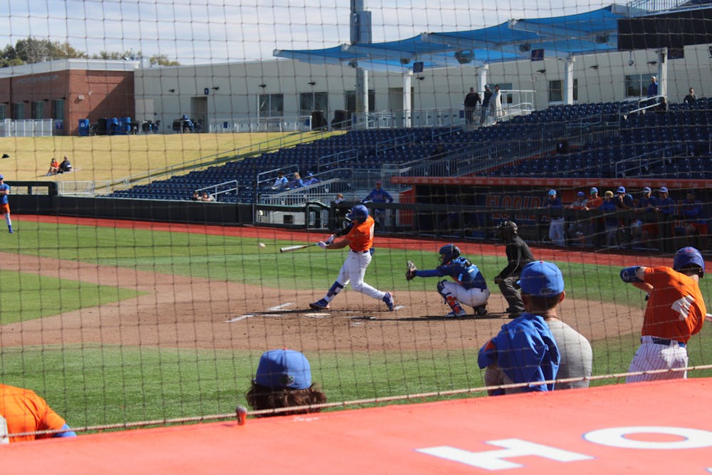 Florida catcher BT Riopelle swings his bat in the Gators' second Spring scrimmage Saturday, Jan. 28, 2023.