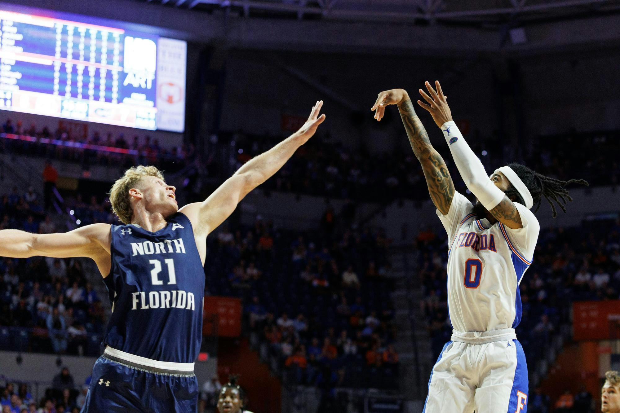 Florida Gators guard Boogie Fland (0) has struggled to shoot the ball beyond the arc, missing a mid range shot during the first half of a NCAA college basketball game against North Florida, Thursday, Nov. 06, 2025, in Gainesville, Fla.
