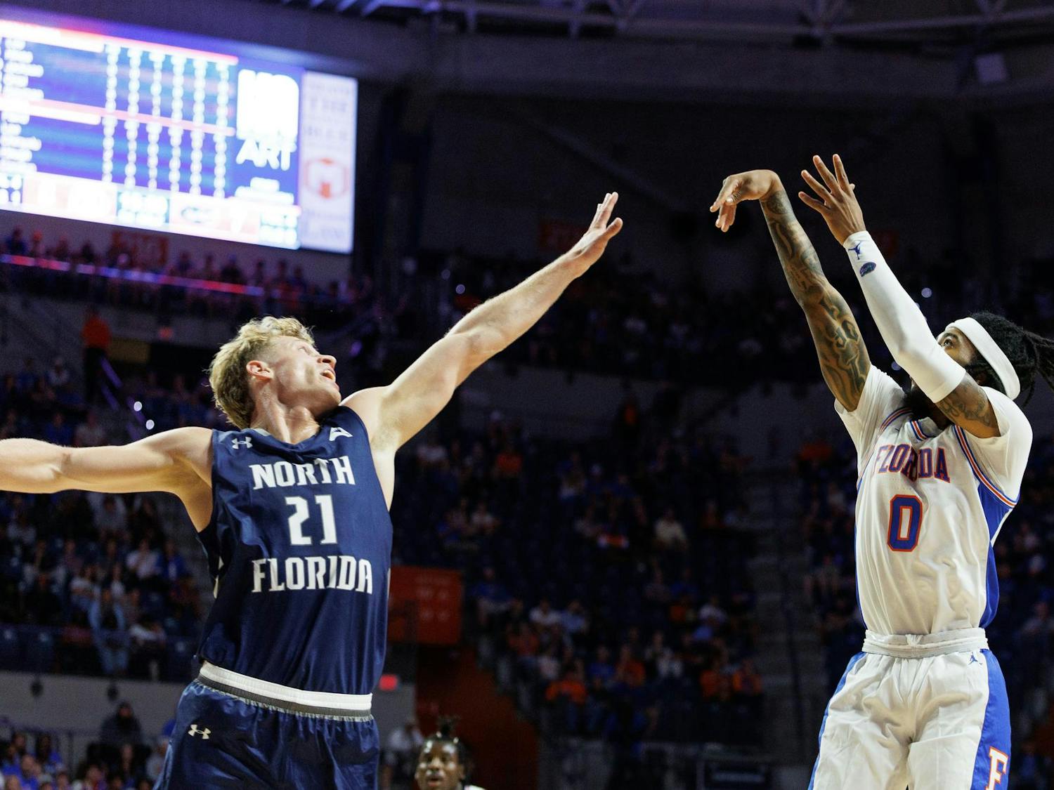 Florida Gators guard Boogie Fland (0) takes a mid range shot during the first half of a NCAA college basketball game against North Florida, Thursday, Nov. 06, 2025, in Gainesville, Fla.