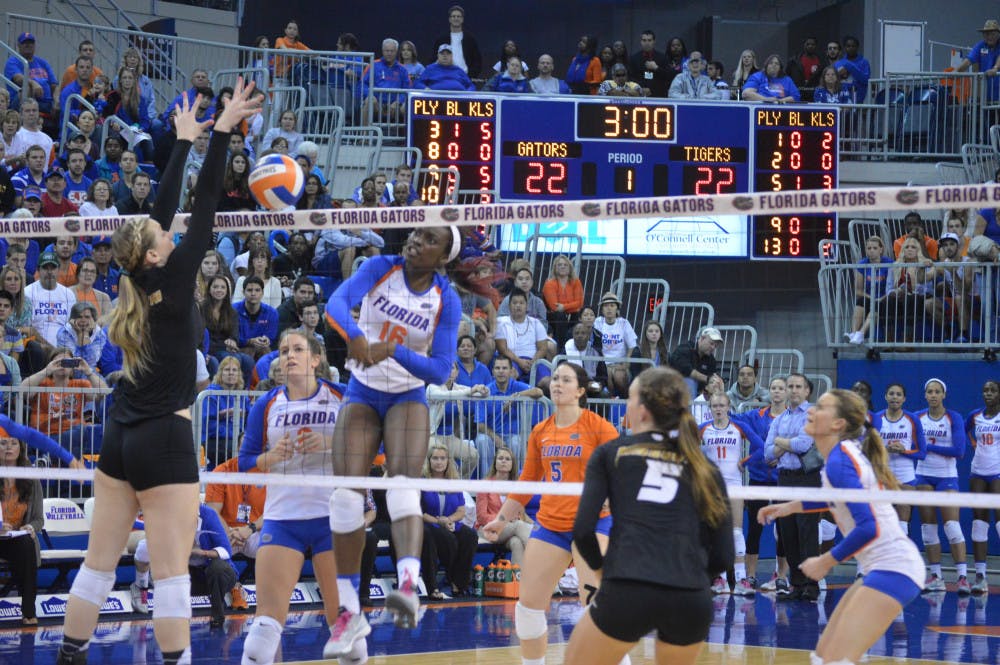 <p>Sophomore middle blocker Simone Antwi spikes the ball during the Gators' 3-0 loss to the Tigers on Friday night in the O'Connell Center.</p>