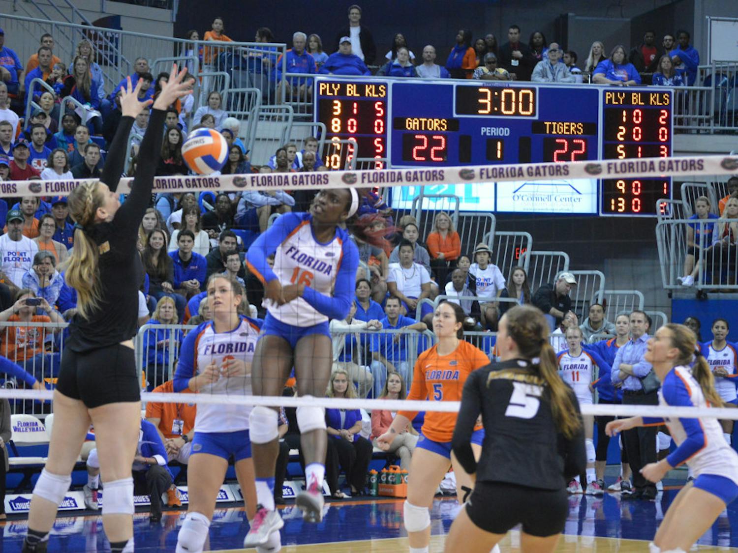 Sophomore middle blocker Simone Antwi spikes the ball during the Gators' 3-0 loss to the Tigers on Friday night in the O'Connell Center.