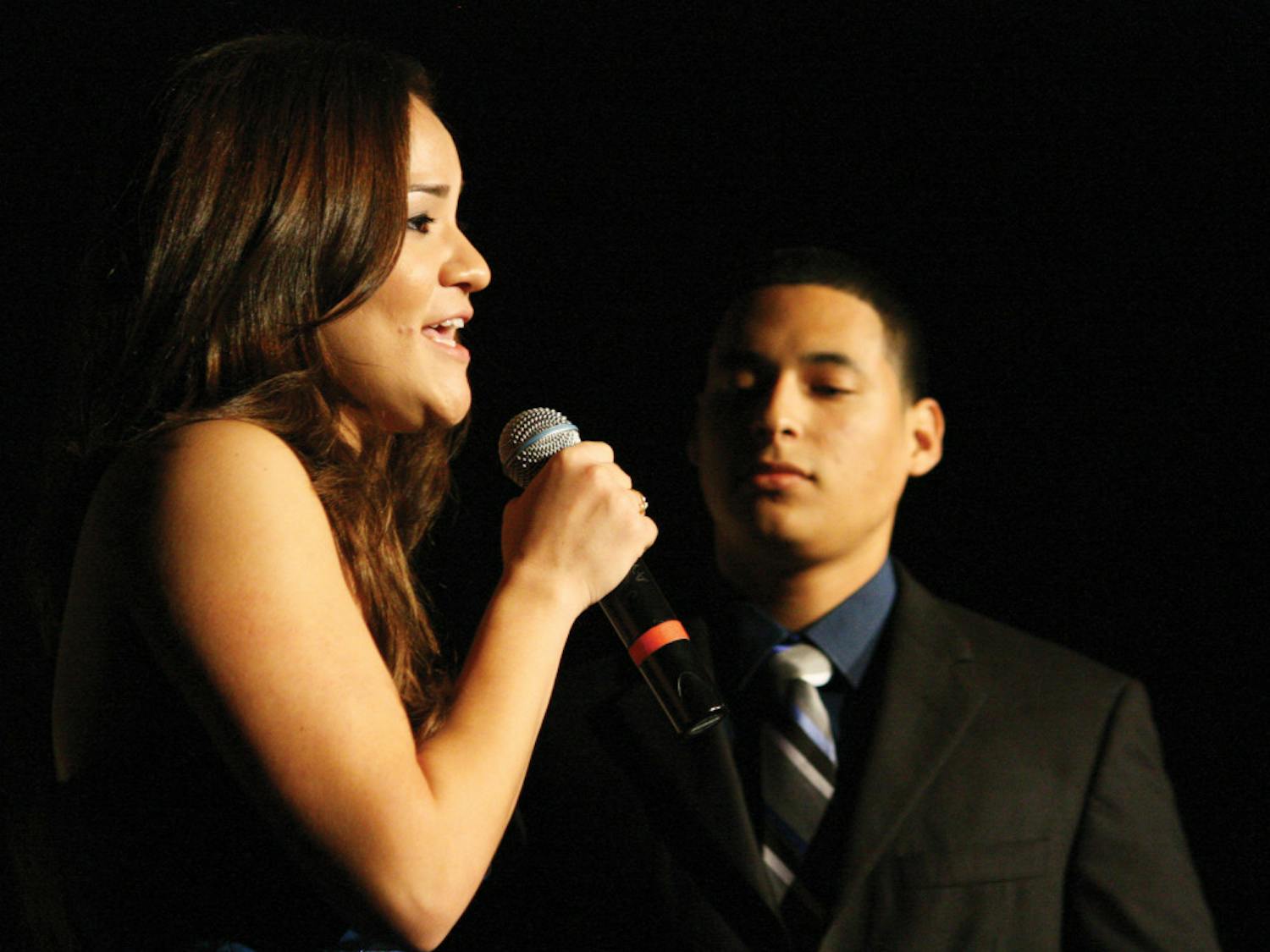 Mistress and master of ceremonies Jennise Acosta and Alex Castro
introduce the acts for the Hispanic Heritage Month Talent Show in
the Reitz Union Grand Ballroom Wednesday night.