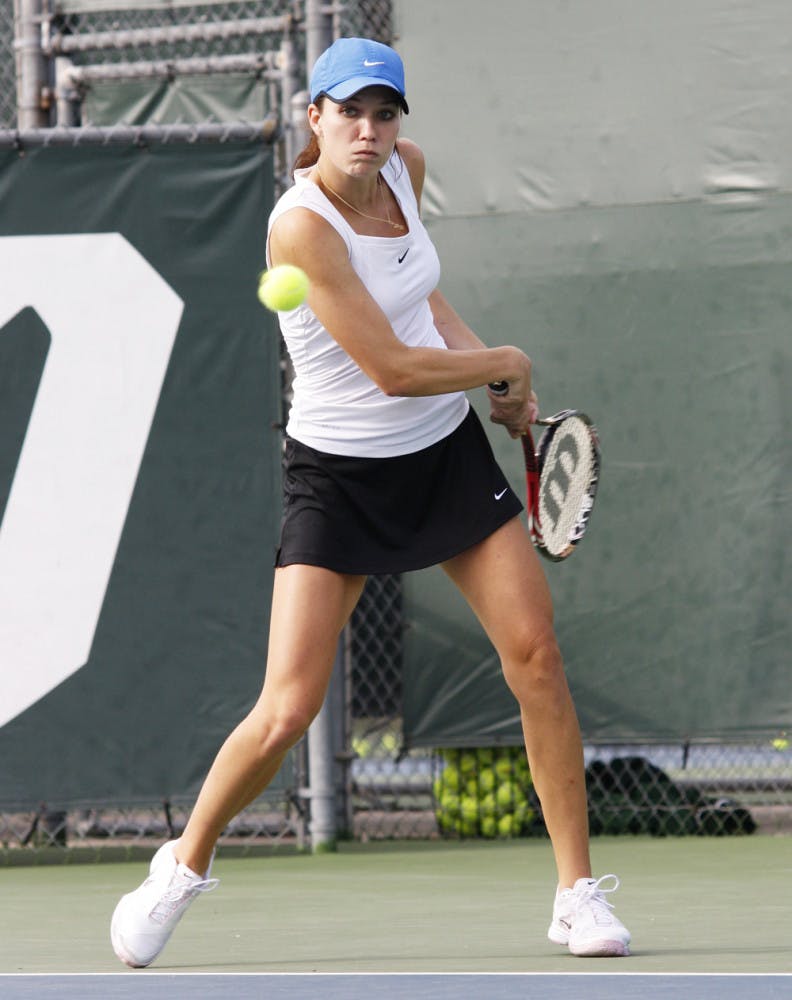 Freshman Danielle Collins returns a serve during UF’s 7-0 win against USF on Jan. 29 at Linder Stadium. Collins teamed with Olivia Janowicz to win the only doubles match for the Gators on Friday.