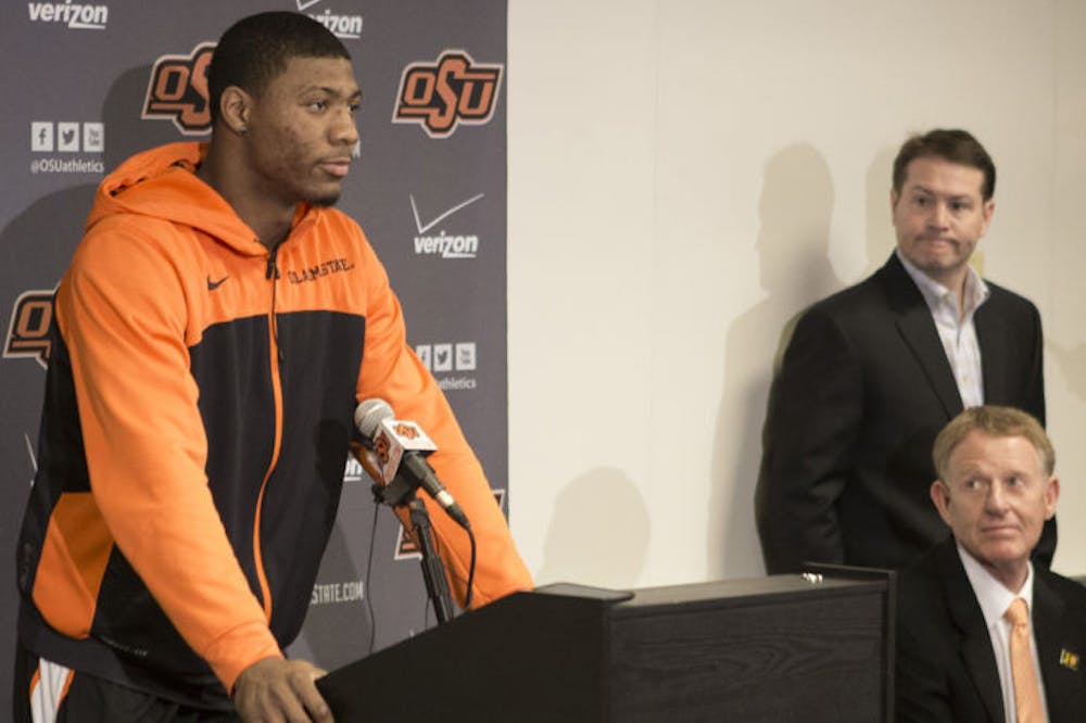 <p>OSU basketball player Marcus Smart addresses the media at a news conference in Stillwater, Okla., Sunday in regard to an altercation during a game the day before.</p>