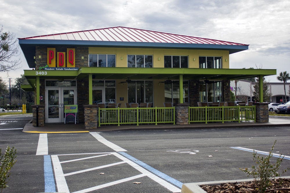 <p>The PDQ store front, as from University Avenue on Tuesday afternoon. PDQ, which stands for People Dedicated to Quality, will open Sunday at 10:30 a.m.</p>