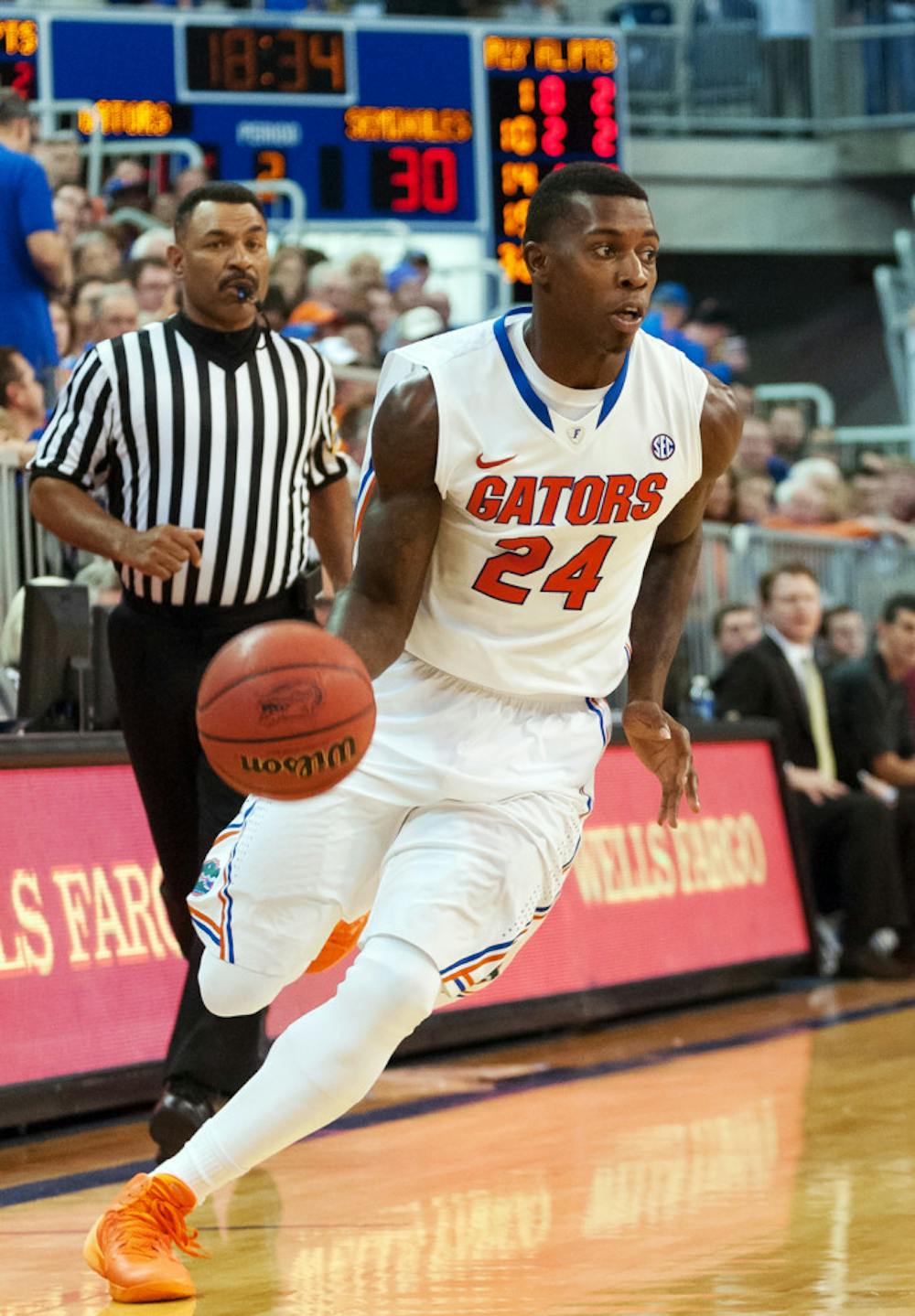 <p>Casey Prather dribbles during Florida’s 67-66 win against Florida State on Nov. 29, 2013, in the O’Connell Center.</p>