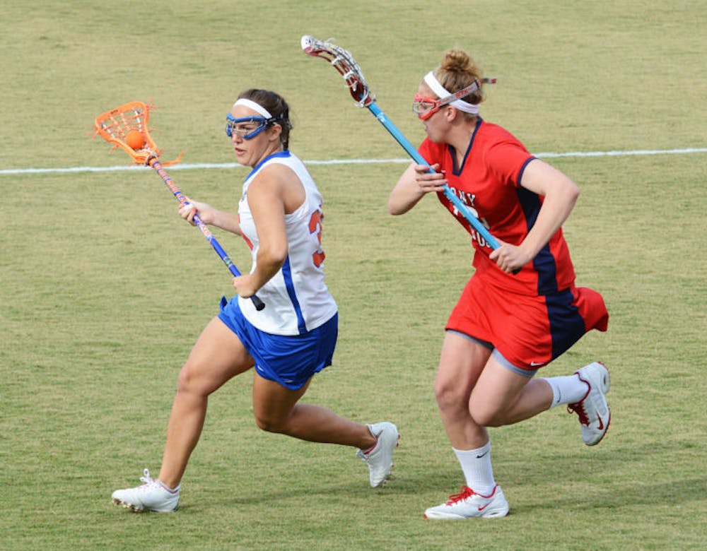 <p align="justify">Senior attacker Gabi Wiegand prepares to take a shot during Florida’s 16-9 win against Stony Brook on Feb. 20 at Dizney Stadium. Wiegand scored four goals against Oregon on Saturday.</p>