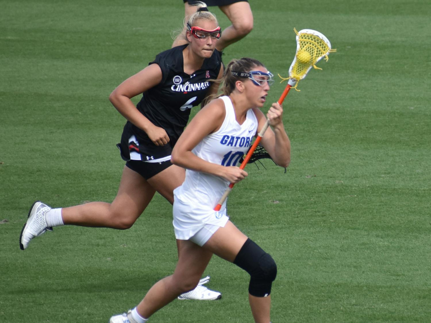 Danielle Pavinelli plays against Cincinnati March 26. She scored her 100th goal of her career at UF Sunday.