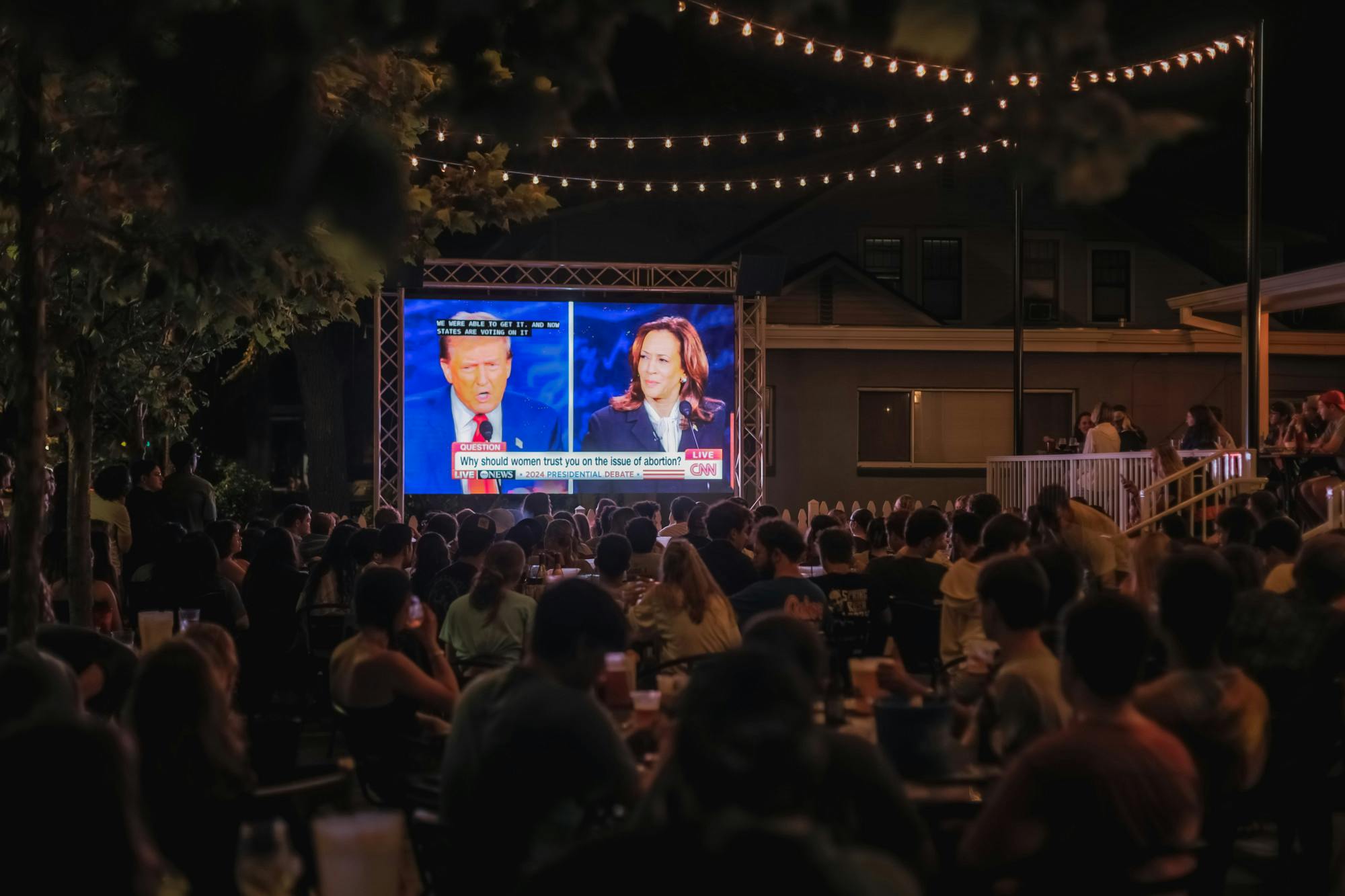 Students and community members watch the first presidential debate at The Swamp on Tuesday, Sept. 10, 2024. 