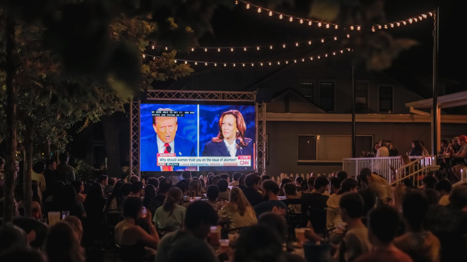 Students and community members watch the first presidential debate at The Swamp on Tuesday, Sept. 10, 2024.
