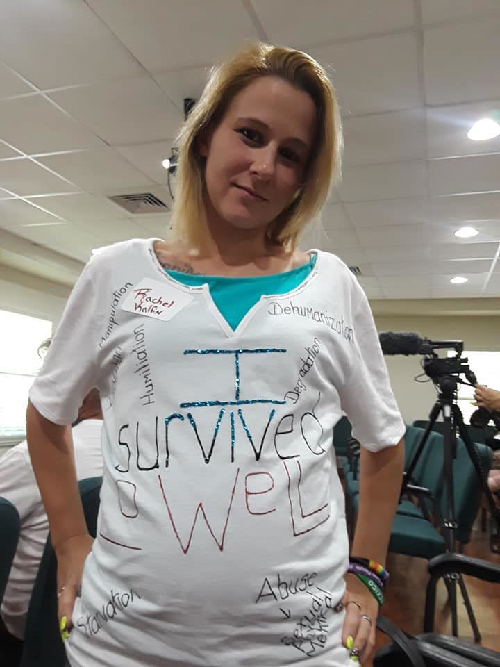 Rachel Kalfin, a former inmate at Lowell Correctional Institution, poses in her “I survived Lowell” shirt. On August 19, she attended a meeting in Ocala with other former inmates to talk to the Department of Justice team about abuses they experienced.