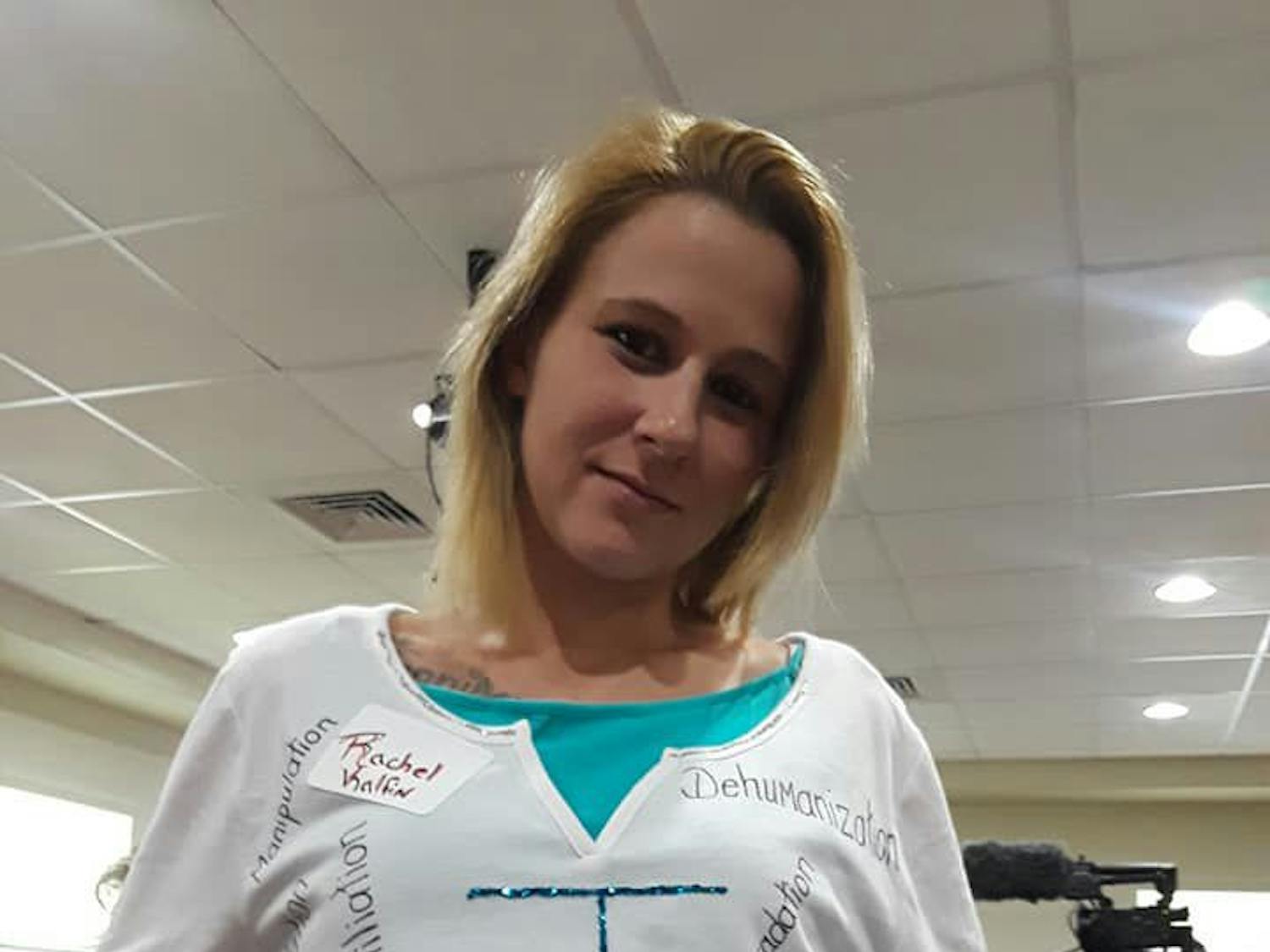 Rachel Kalfin, a former inmate at Lowell Correctional Institution, poses in her “I survived Lowell” shirt. On August 19, she attended a meeting in Ocala with other former inmates to talk to the Department of Justice team about abuses they experienced.