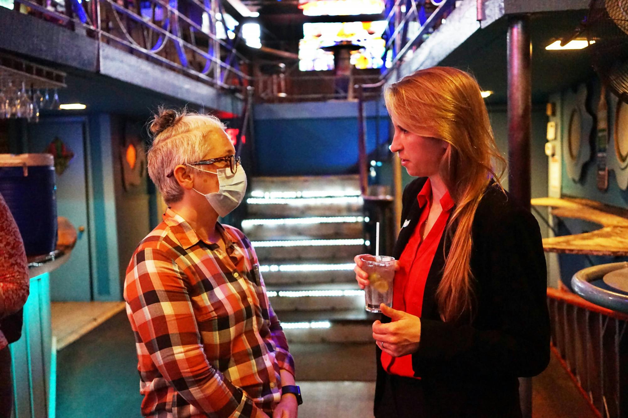 Panelists Dr. Jennifer Evans (left) and Simone Chriss (right) speak after a panel on Florida’s LGBTQ legislation at University Club on Thursday, June 1, 2023. 