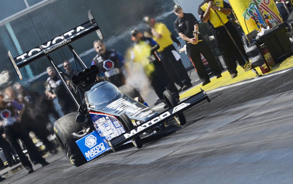<p>A top-fuel dragster races during Gatornationals on March 15 at Auto-Plus Raceway at Gainesville. The track hosts the annual national drag racing event each spring as well as weekly Test &amp; Tune events.</p>
