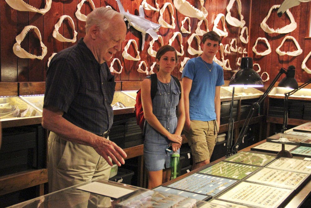 The UF Marine Biology Club visits the home of Dr. Gordon Hubbell, left, on Oct. 6, 2015. The amateur shark paleontologist's collection of shark teeth and jaws is one of the largest in the world.