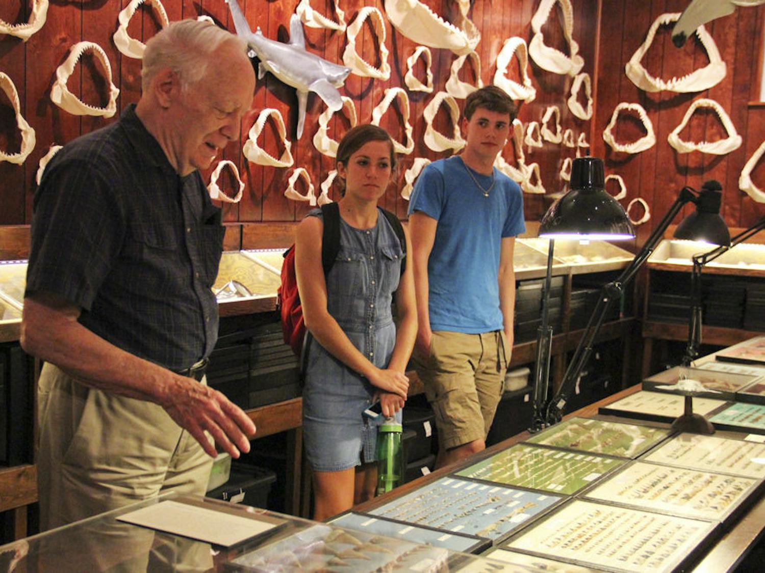 The UF Marine Biology Club visits the home of Dr. Gordon Hubbell, left, on Oct. 6, 2015. The amateur shark paleontologist's collection of shark teeth and jaws is one of the largest in the world.