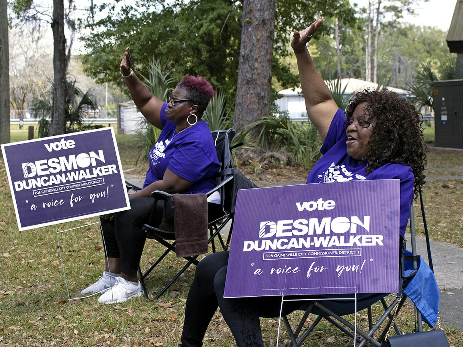 Peggy Golston, 63, (left) and Brendel Lovette, 67, (right) picket at the Mt. Carmel Baptist Church Precinct 30 polling place to show their support for Desmon Duncan-Walker, the District 1 Gainesville City Commissioner-elect, on Tuesday, March 16, 2021.