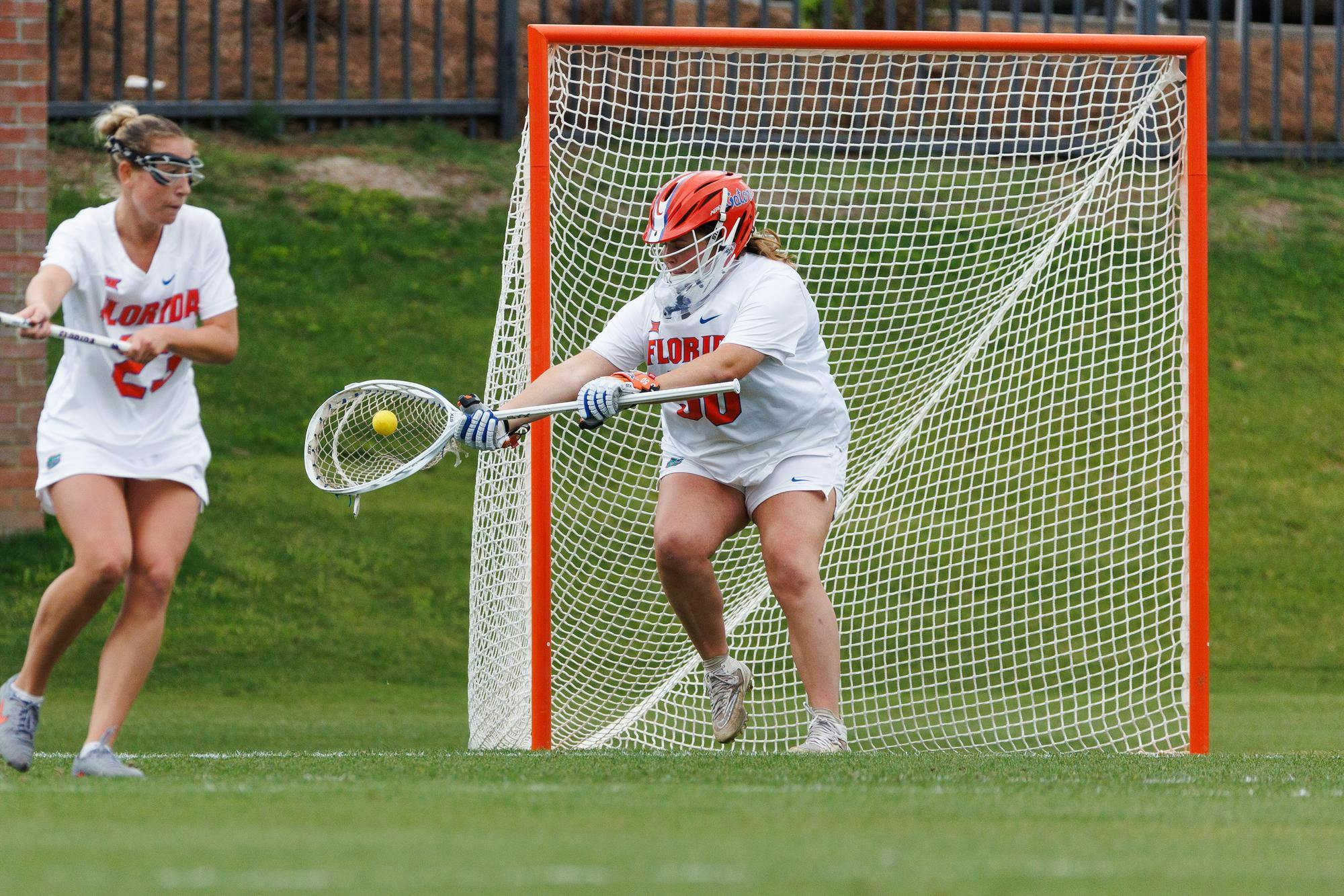 Florida goalkeeper Susan Radebaugh (50) saves a shot during an NCAA Lacrosse game against South Florida, Wednesday, April 8, 2026, in Gainesville, Fla.