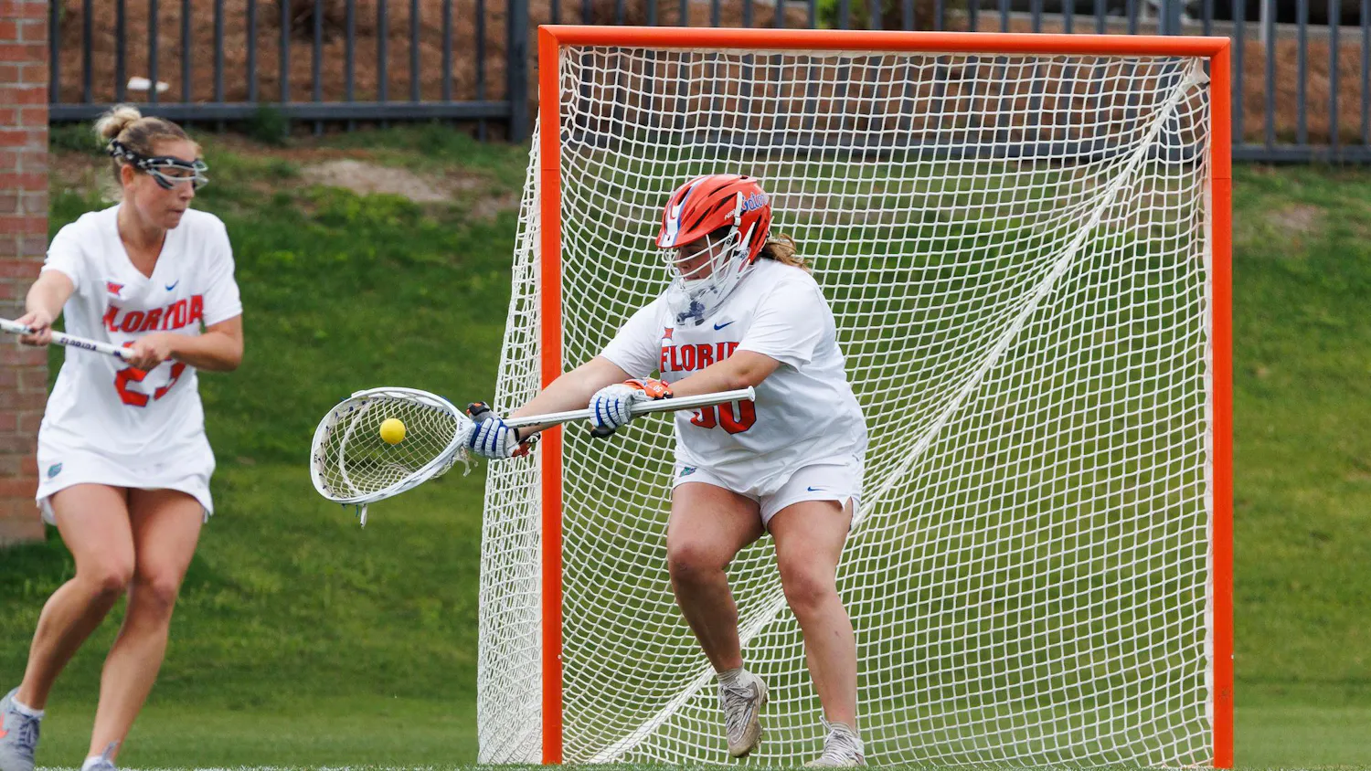 Florida goalkeeper Susan Radebaugh (50) saves a shot during an NCAA Lacrosse game against South Florida, Wednesday, April 8, 2026, in Gainesville, Fla.