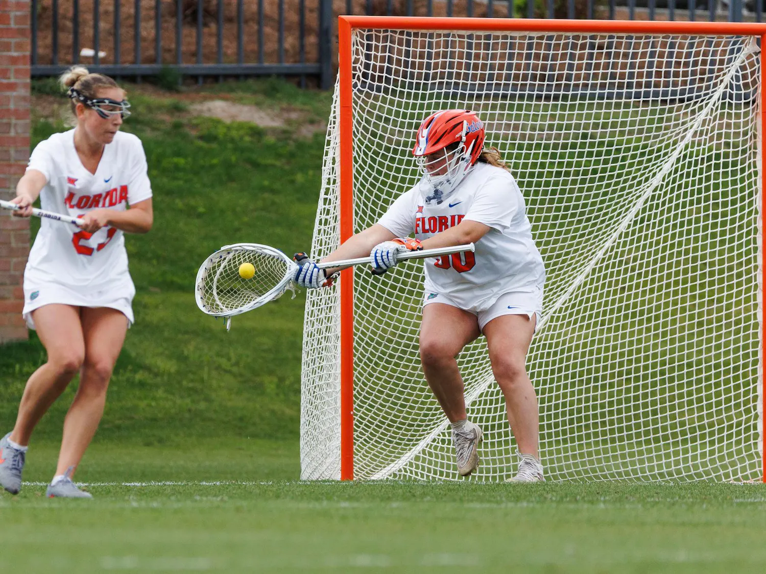 Florida goalkeeper Susan Radebaugh (50) saves a shot during an NCAA Lacrosse game against South Florida, Wednesday, April 8, 2026, in Gainesville, Fla.