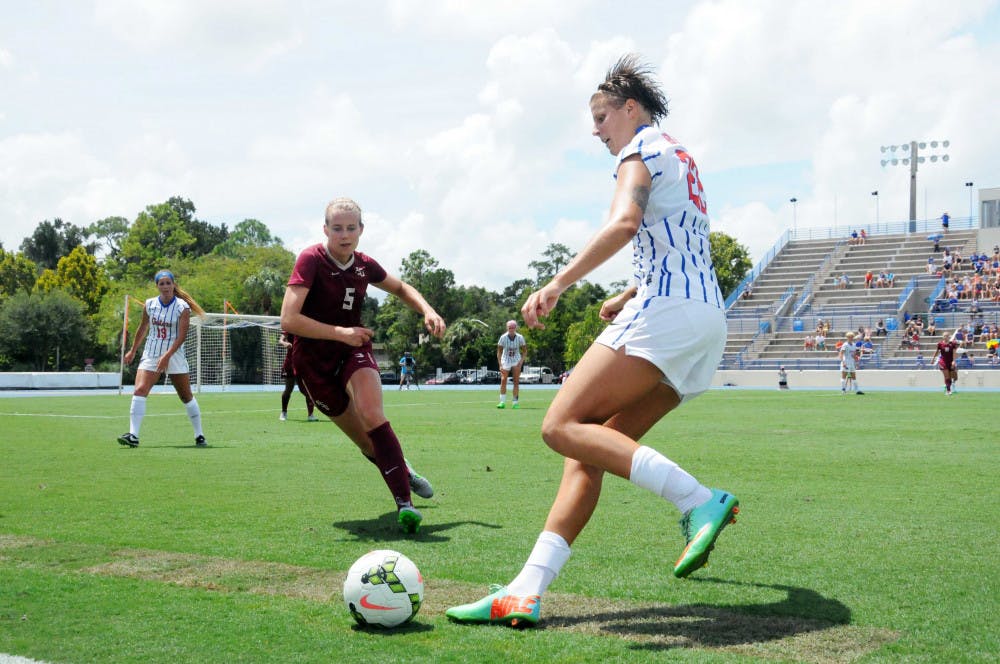 UF midfielder Pamela Begic dribbles the ball while FSU's Elin Jensen (5) approaches during the first half of Florida's 3-2 win against Florida State on Aug. 30, 2015, at James G. Pressly Stadium.
