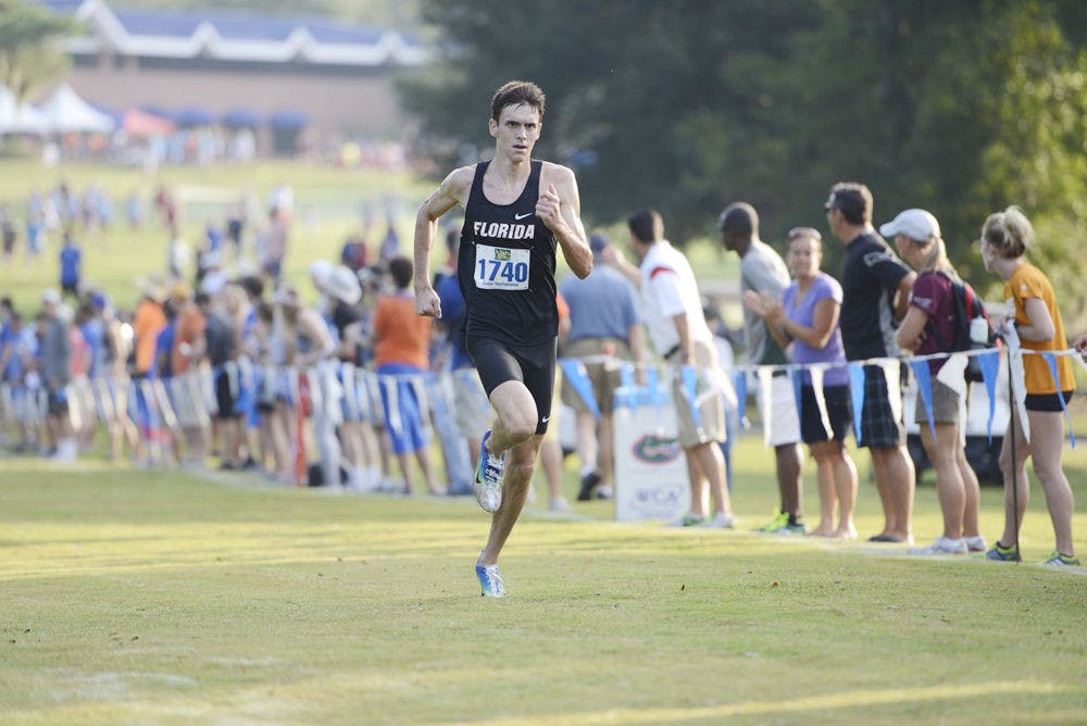 Mark Parrish runs in the Mountain Dew Invitational on Sept. 14, 2013, on UF's Mark Bostick Golf Course.