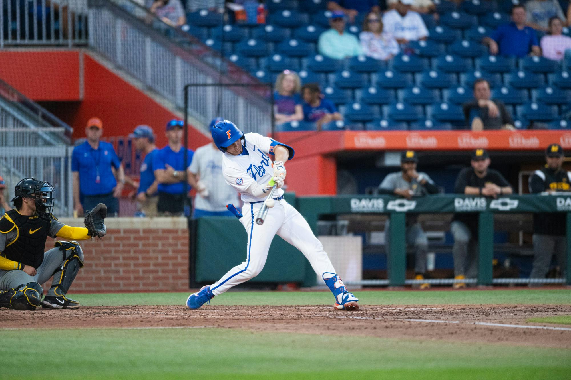 Florida Gators catcher Luke Heyman (28) hits the ball in a baseball game against the Missouri Tigers on Thursday, April 10, 2025, in Gainesville, Fla.