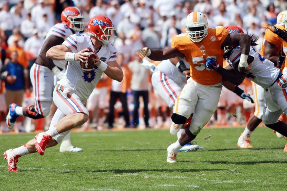 <p>Jeff Driskel scrambles during Florida's 10-9 win against Tennessee.</p>