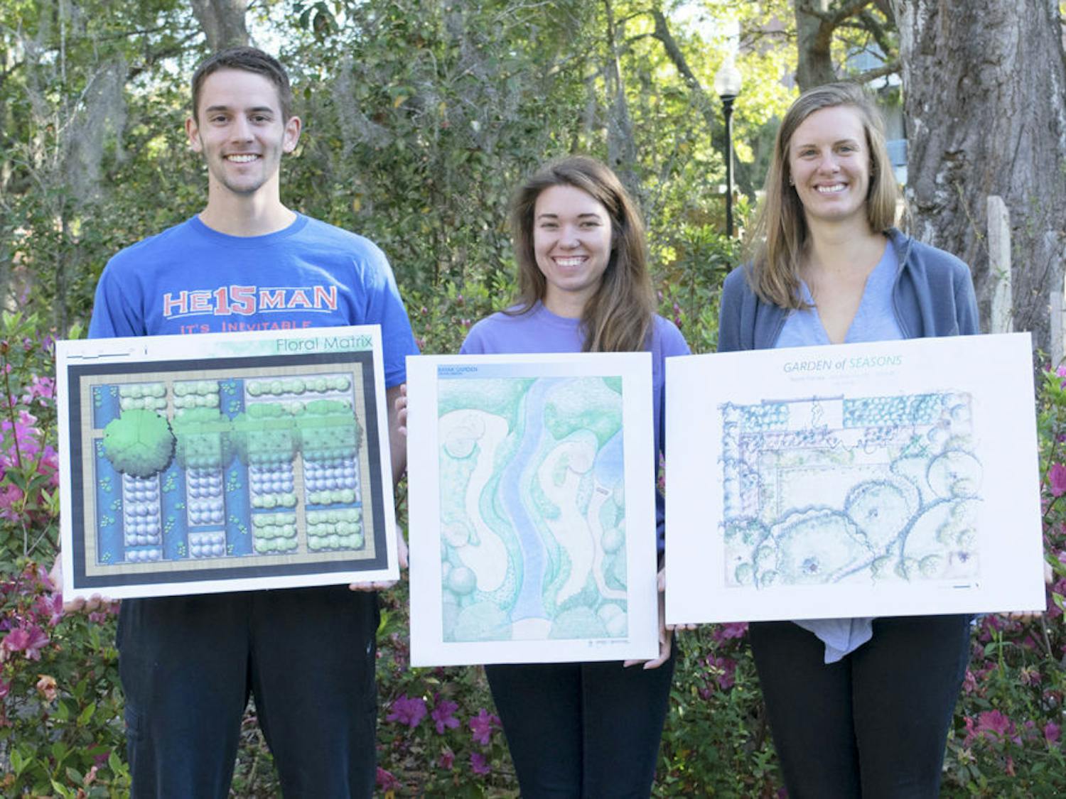 From left, Florida Association of Native Nurseries: Real Florida Landscapes Design Competition winners, Collin Bowie, the South Florida award winner; Crystal Simmons, the Central Florida award winner and Lea Kindt, the North Florida award winner, pose for a photo with their winning designs for a Florida landscape.