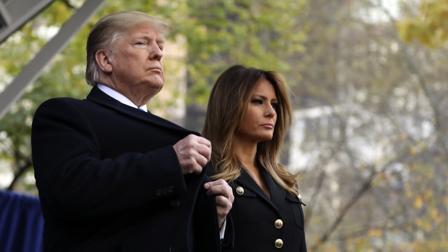 President Donald Trump and first lady Melania Trump attend ceremony at the New York City Veterans Day Parade at Madison Square Park in New York, Monday, Nov. 11, 2019. (AP Photo/Andrew Harnik)