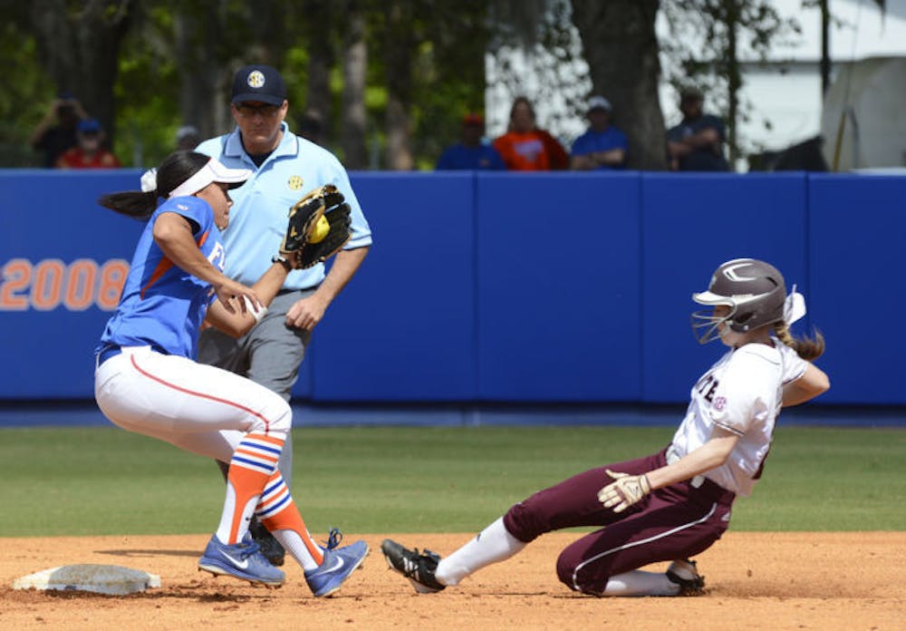 <p>Kelsey Stewart attempts to tag out a runner during Florida’s 4-2 win against Mississippi State on April 6, 2013. Stewart hit .378 with 10 triples in her freshman season.</p>
