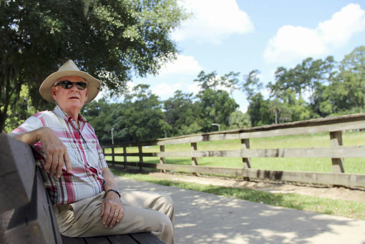 Rod McGalliard, 67, talks about why he doesn't want UF's loblolly pine trees overlooking the golf course to be removed. Nine of the trees will be cut down to increase the amount of sunlight that reaches the turf.