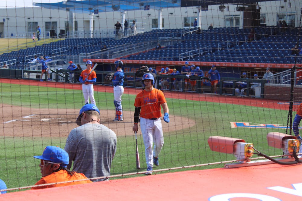 Florida catcher BT Riopelle walks to the dugout in the Gators' second Spring scrimmage Saturday, Jan. 28, 2023.