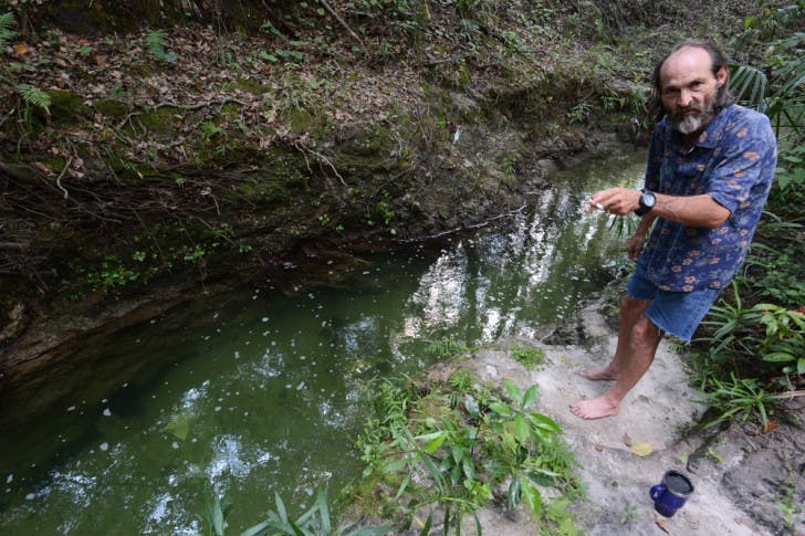J.C. Goodwin, on Wednesday afternoon at the scene of the attack, explains how his friend, James Wimmer, was attacked by an alligator two days earlier.